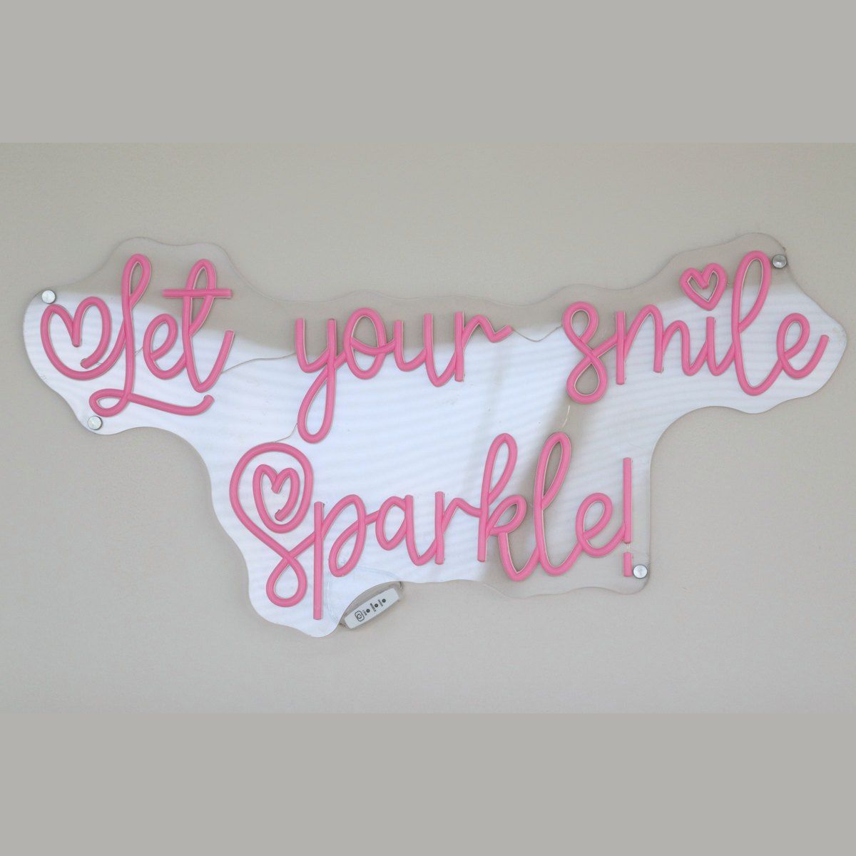 Let your smile sparkle neon sign at Sparkle Orthodontics